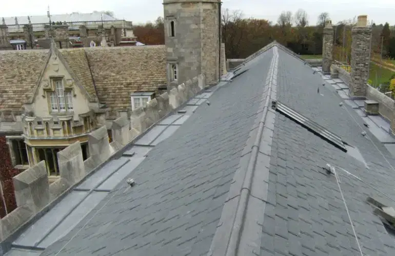Burlington slate roof between stone gables at Trinity College, Cambridge